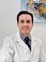 Dr. Claudio Merlos